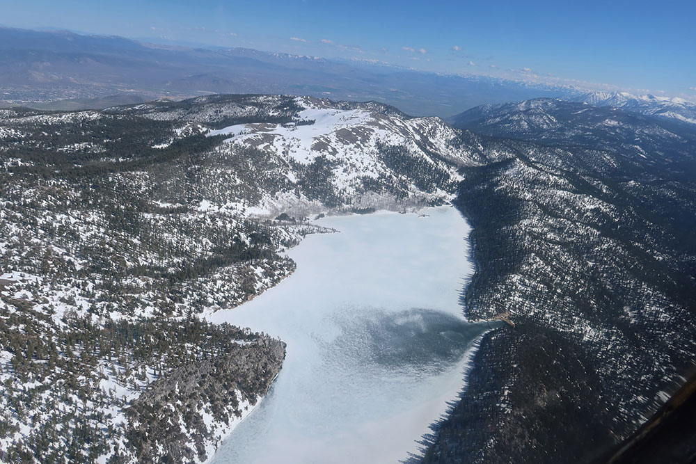 Minden SY Frozen Lake in mountains above Lake Tahoe